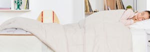 child sleeping in saatva youth mattress
