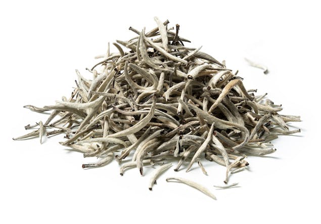 pile of white tea leaves