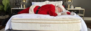 santa claus lying on a saatva mattress