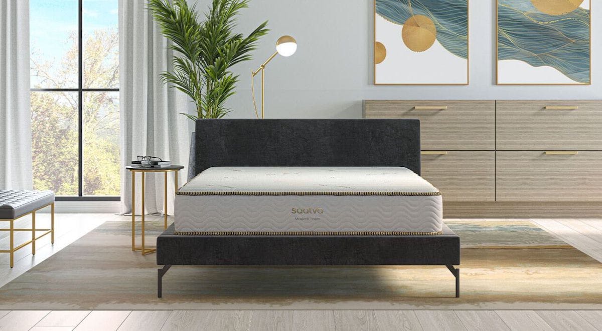bedroom with saatva modern foam mattress and plants in it