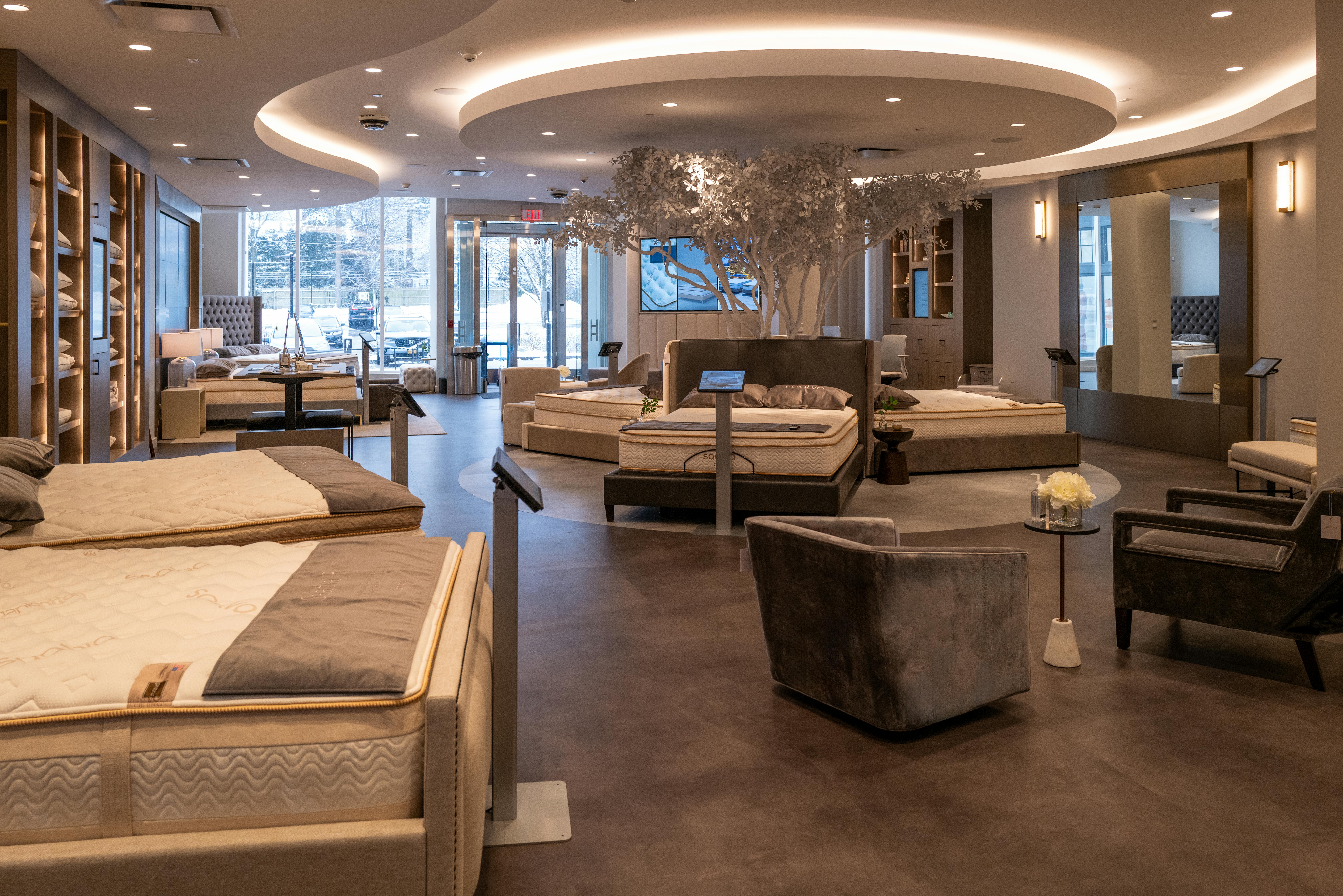 The cozy mattress testing areas inside the new Saatva Manhasset Viewing Room on Long Island.
