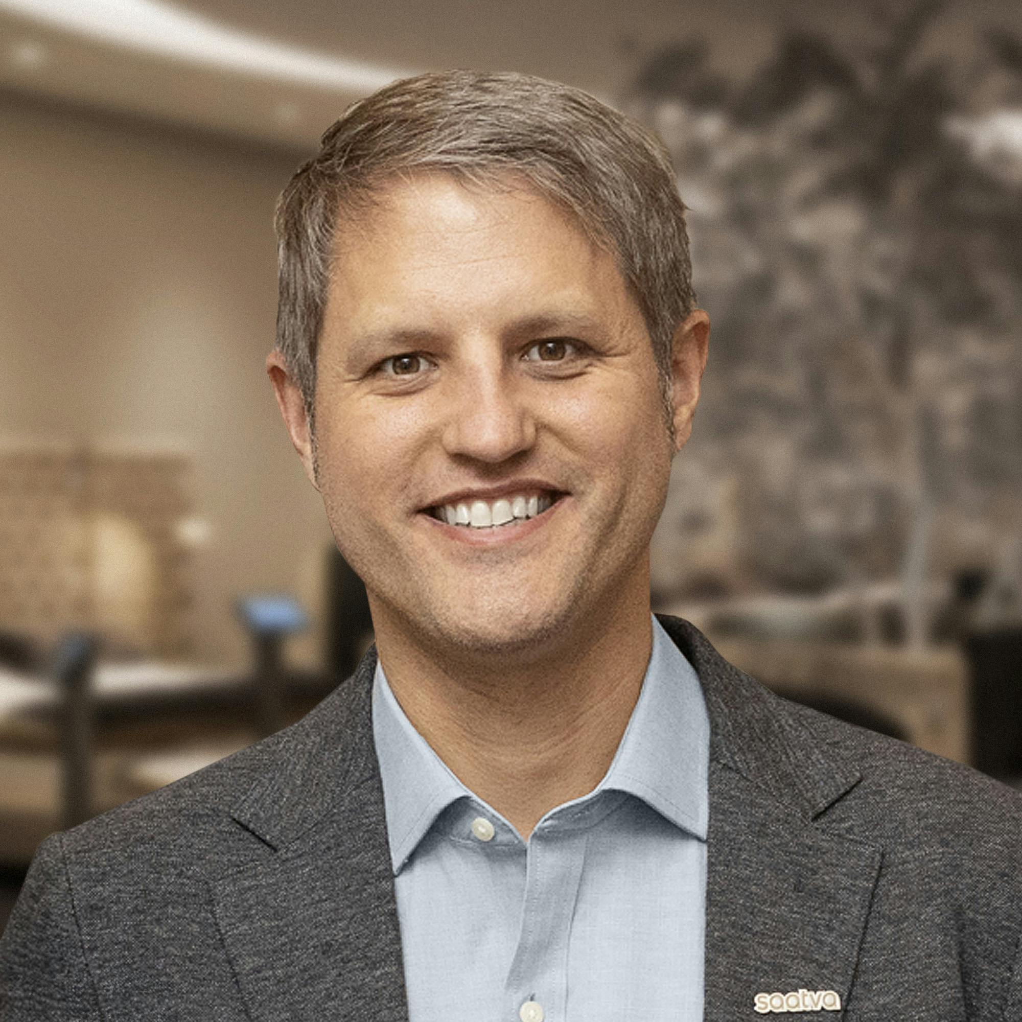 Headshot of Saatva's Chief Technology and Digital Officer, Evan Huston, from the Saatva Boston Viewing Room Opening Event