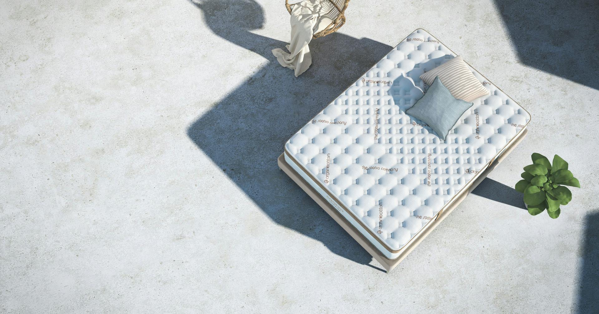 A birdseye view of Saatva's Loom & Leaf Mattress in a Mediterranean outdoor oasis.