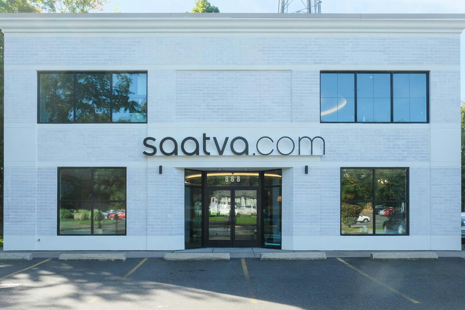 Saatva Westport's white, elegant two-floor storefront. 