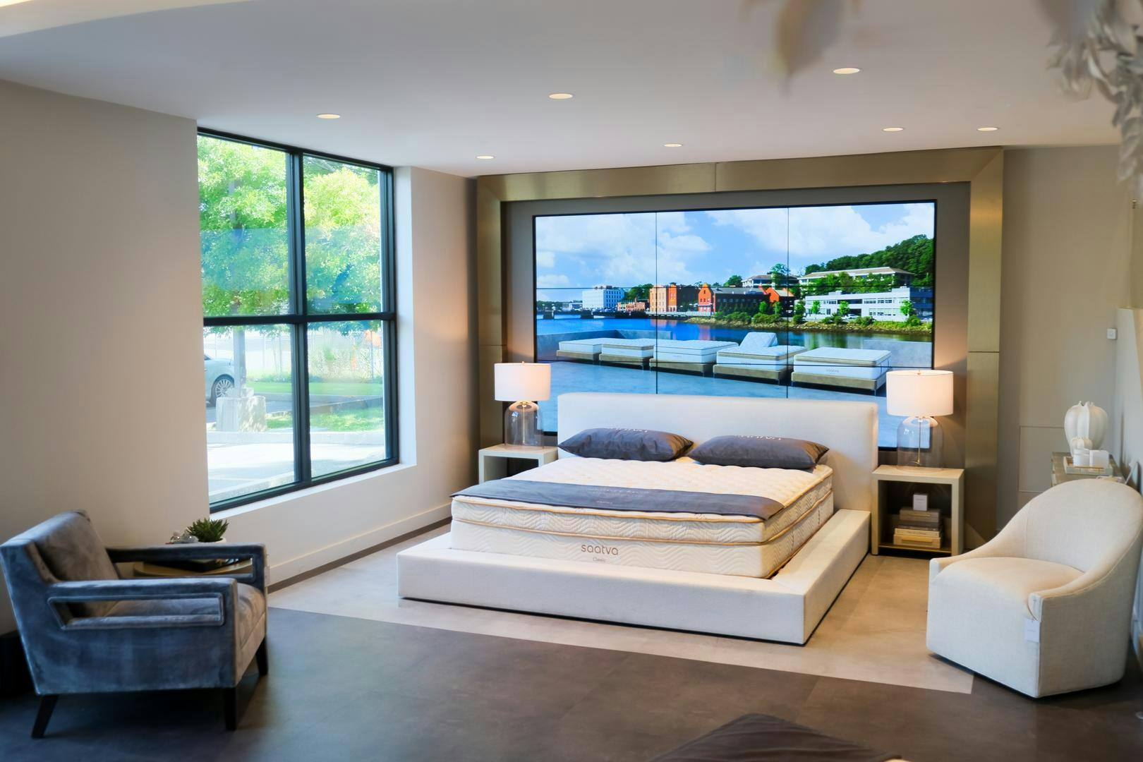 Saatva Westport's Hero Bed with a headboard created by nine high-definition Samsung screens that can be programmed to display different relaxing images and videos.