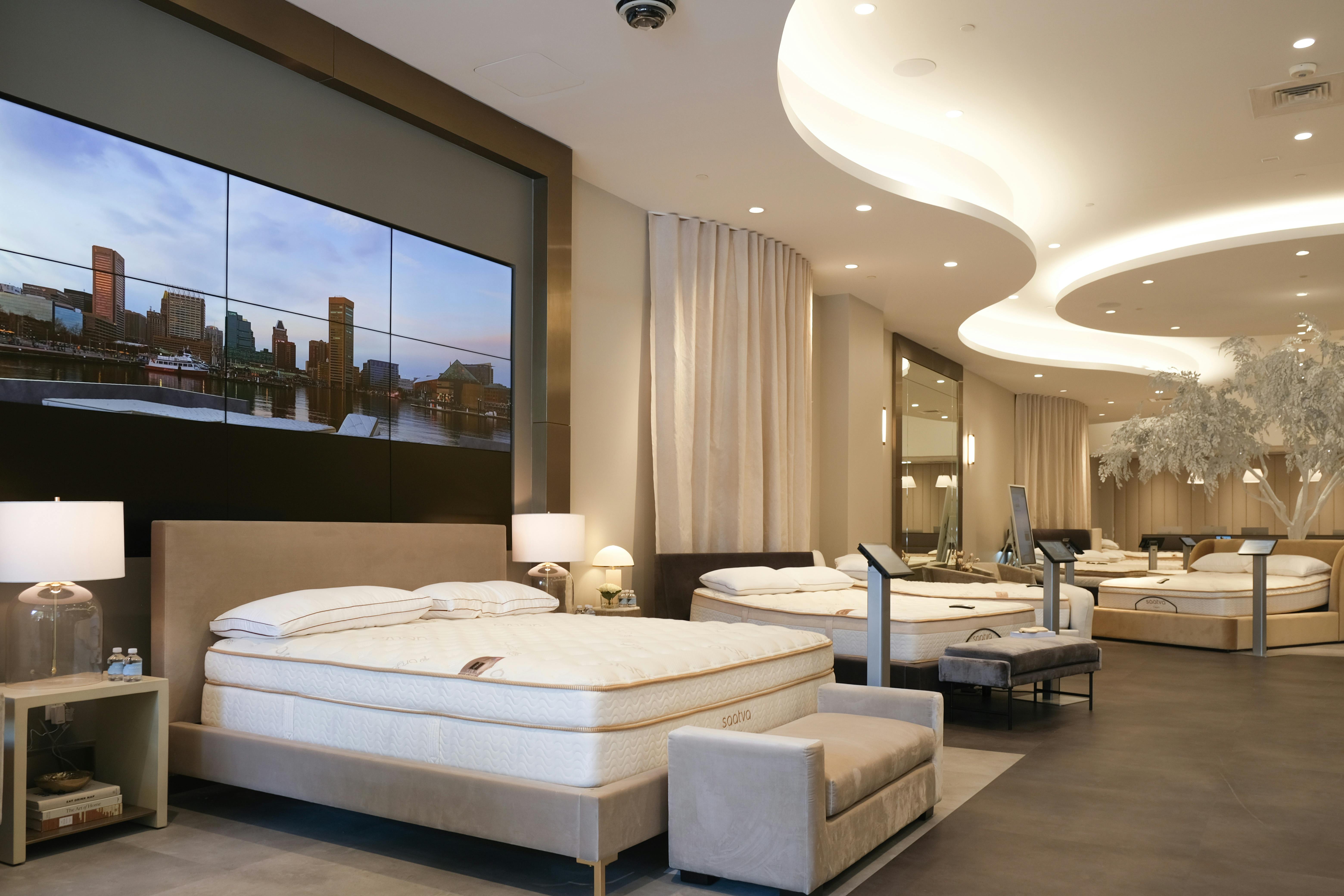 Saatva Baltimore's Hero Bed display, comprised of nine high-definition Samsung displays that form a customizable digital headboard