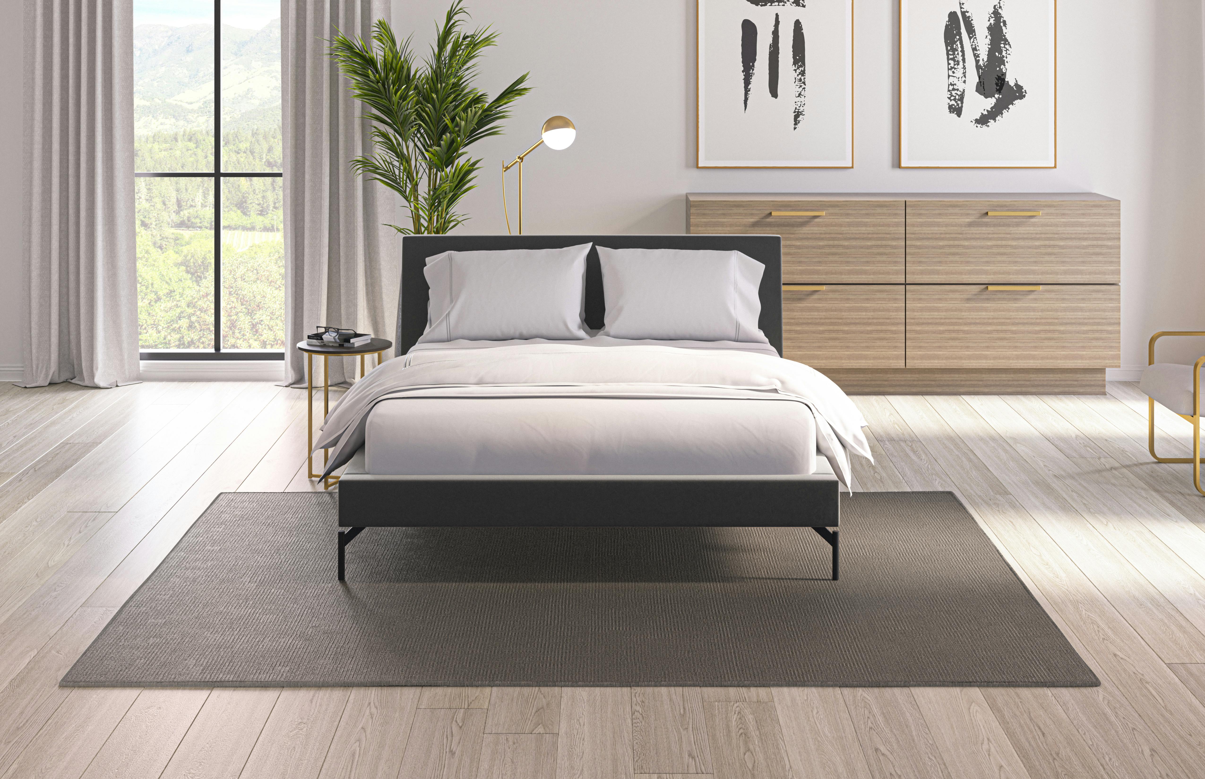 Add an elemental accent to any space with the Myra Handcrafted Bedroom Rug.