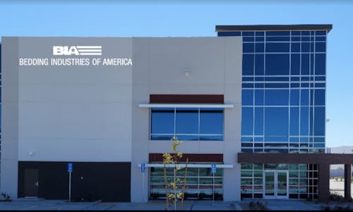 An exterior image of Bedding Industry of America's new factory in Rialto, California.
