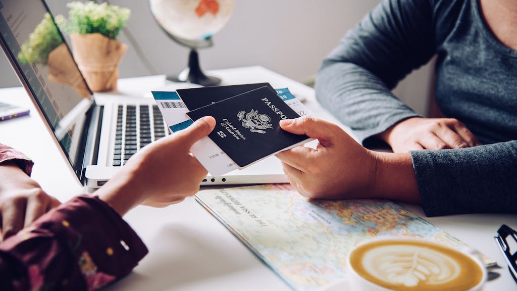 Person giving the passport to another person