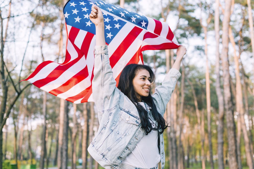 Girl waving a United States flag