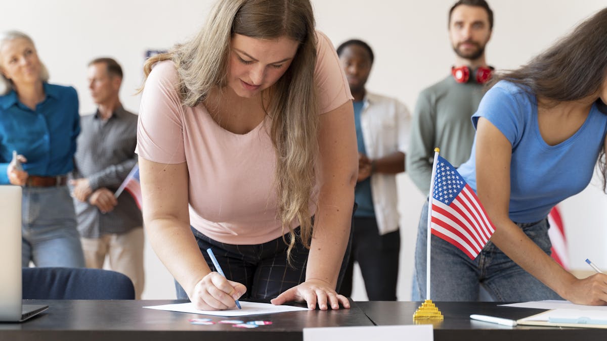 People voting in the United States elections Image by <a href="https://www.freepik.com/free-photo/people-registering-vote-united-states_18301085.htm#query=vote%20united%20states&position=33&from_view=search&track=sph">Freepik</a>