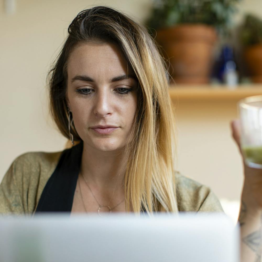 Relaxed woman working from home on her laptop. <a href="https://www.freepik.com/free-photo/relaxed-woman-working-from-home-her-laptop_3679560.htm#query=expat&position=34&from_view=search&track=sph">Image by rawpixel.com</a> on Freepik