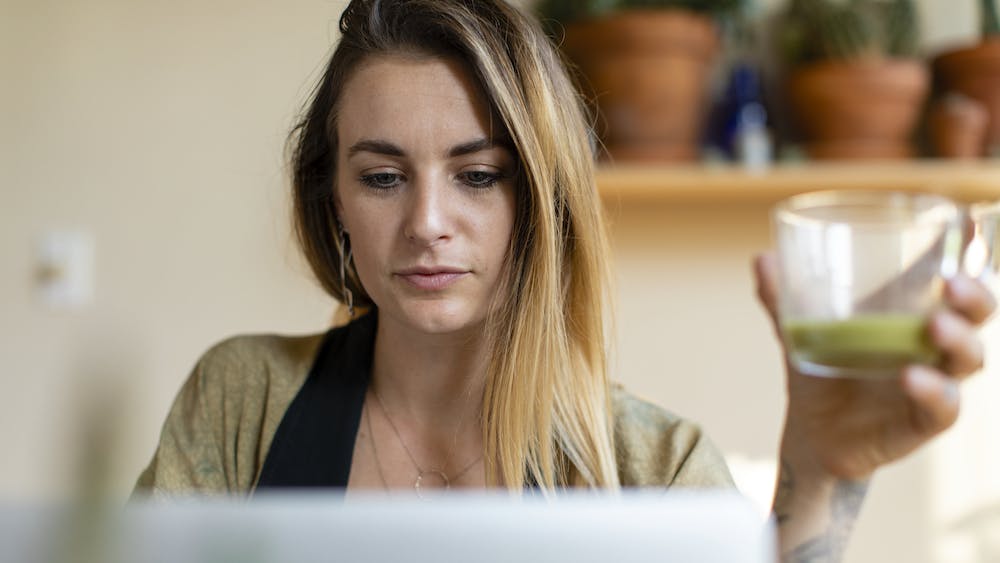 Relaxed woman working from home on her laptop. <a href="https://www.freepik.com/free-photo/relaxed-woman-working-from-home-her-laptop_3679560.htm#query=expat&position=34&from_view=search&track=sph">Image by rawpixel.com</a> on Freepik