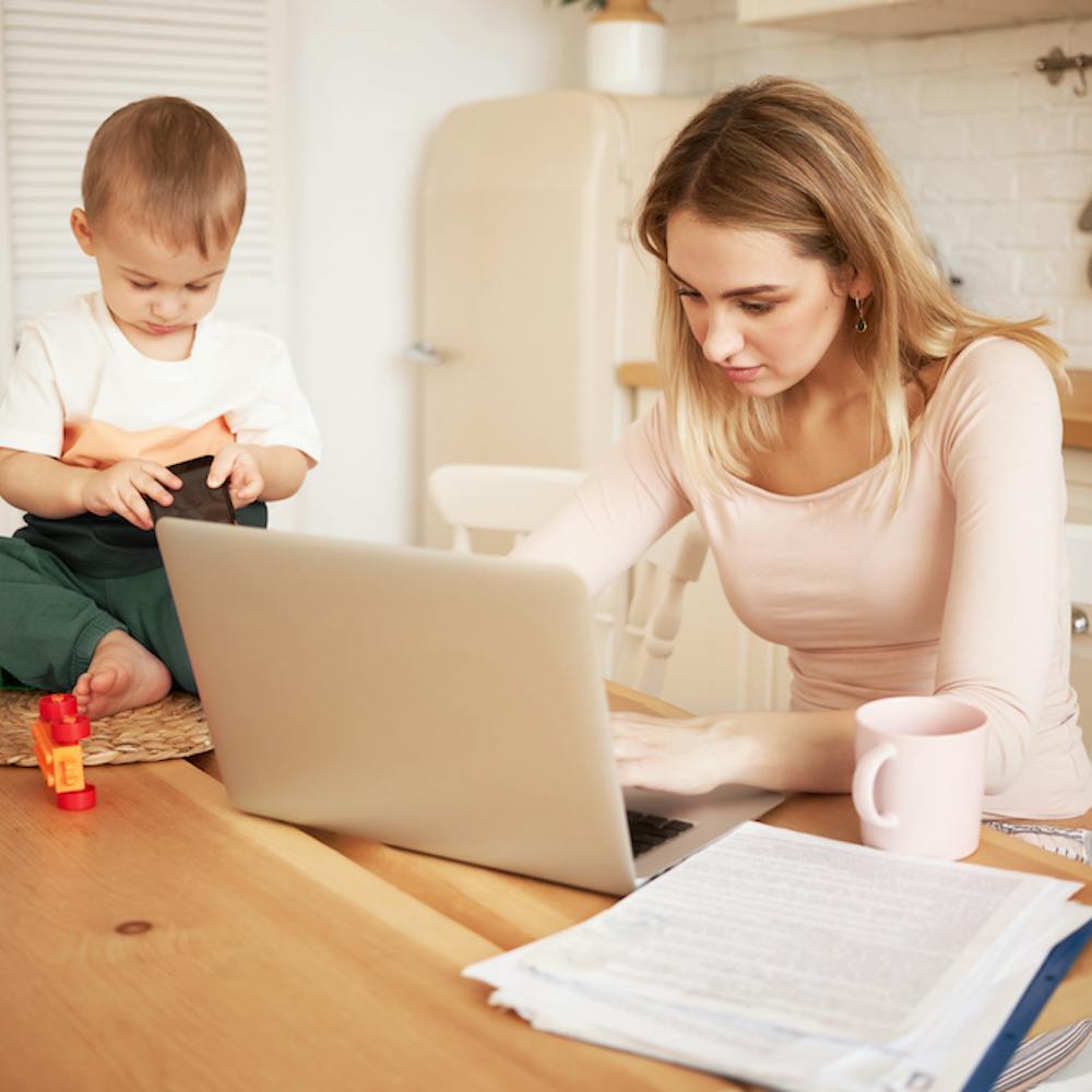 Young blonde female sitting at kitchen table with papers and portable computer with her baby son while he is staying at home with her<a href="https://www.freepik.com/free-photo/worried-upset-young-blonde-female-sitting-kitchen-table-with-papers-portable-computer-feeling-stressed-because-she-has-make-report-take-care-her-baby-son-while-he-is-staying-home_11193269.htm#query=child%20tax%20credit&position=23&from_view=search&track=ais&uuid=08752235-bf7d-475f-ac41-b4bcf0edd23d">Image by shurkin_son</a> on Freepik