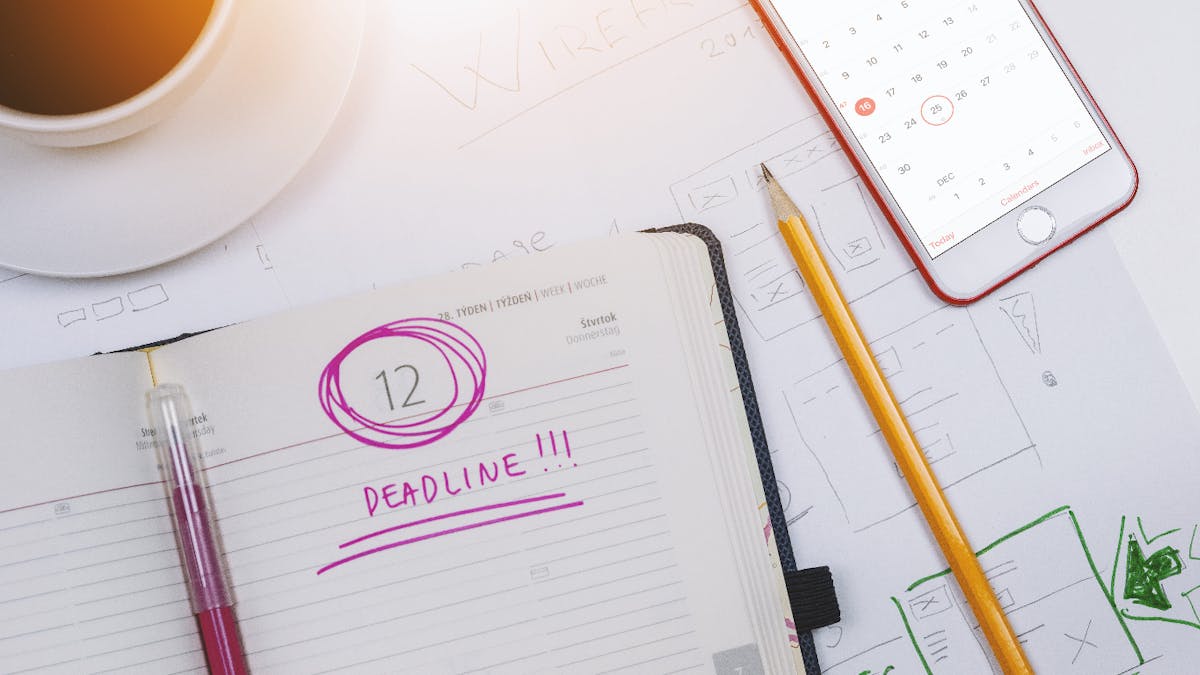 Notebook opened with "Deadline" word written