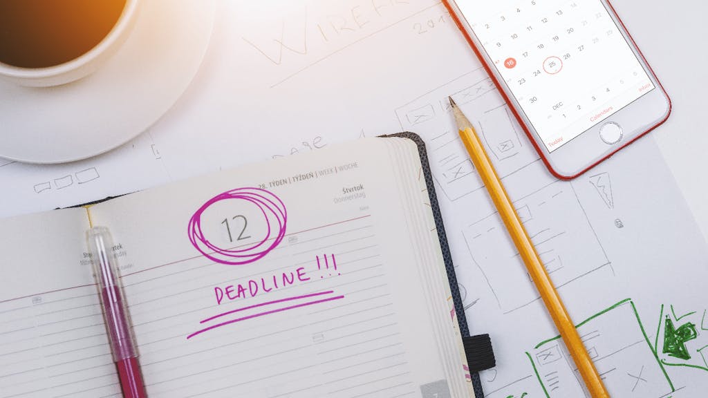 Notebook opened with "Deadline" word written