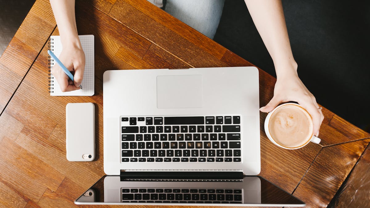 topview-workspace-with-laptop-coffee