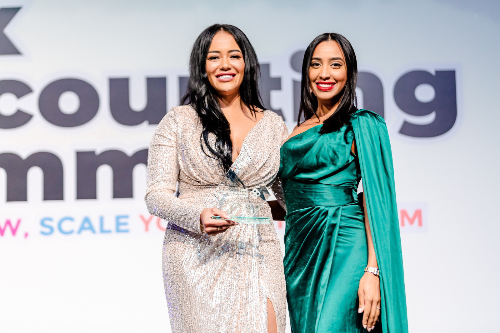 Alexandra receiving a prize in the tax accounting summit