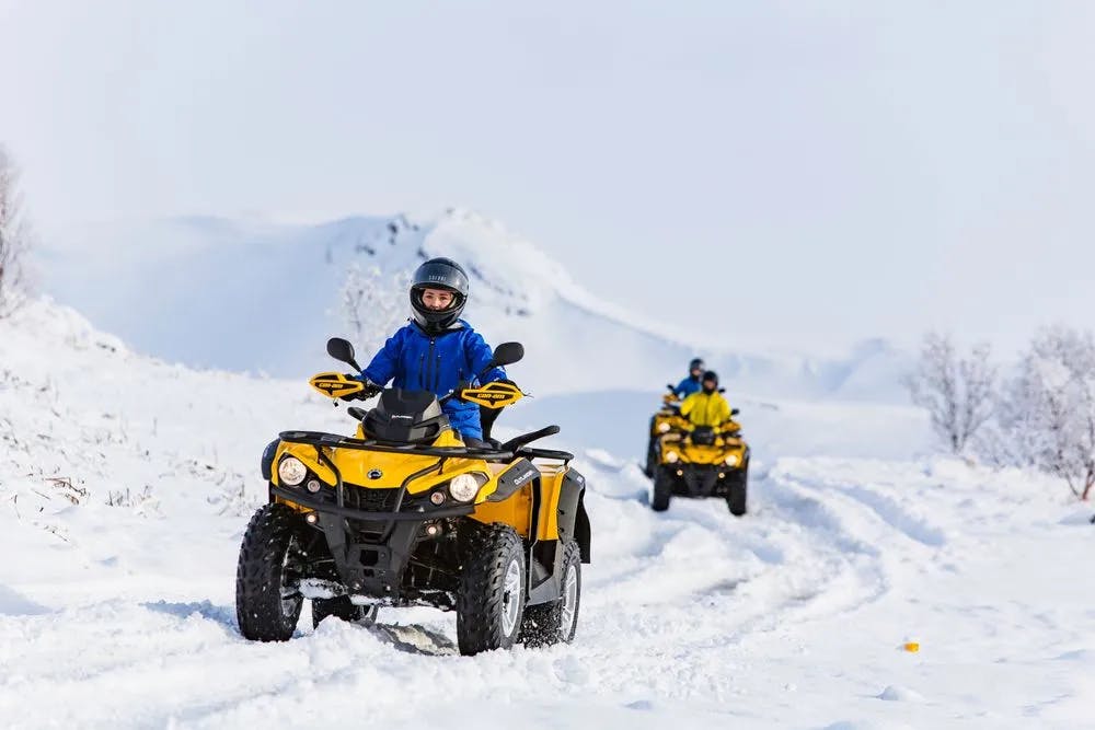 Group of ATVs exploring Iceland's winter wonderland