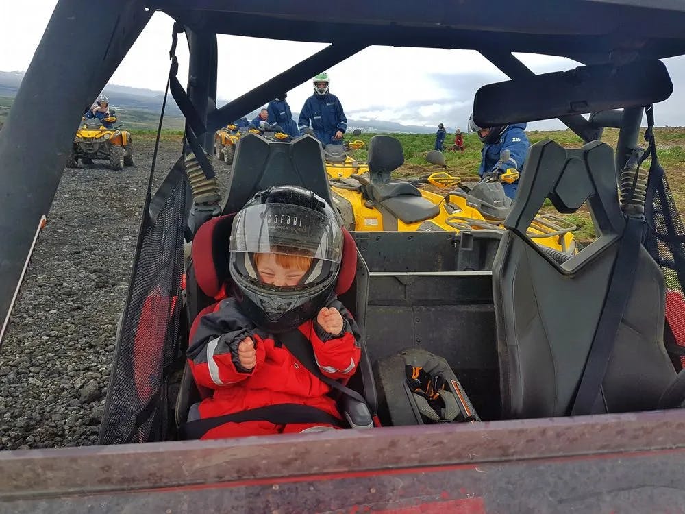 Happy child in a buggy tour