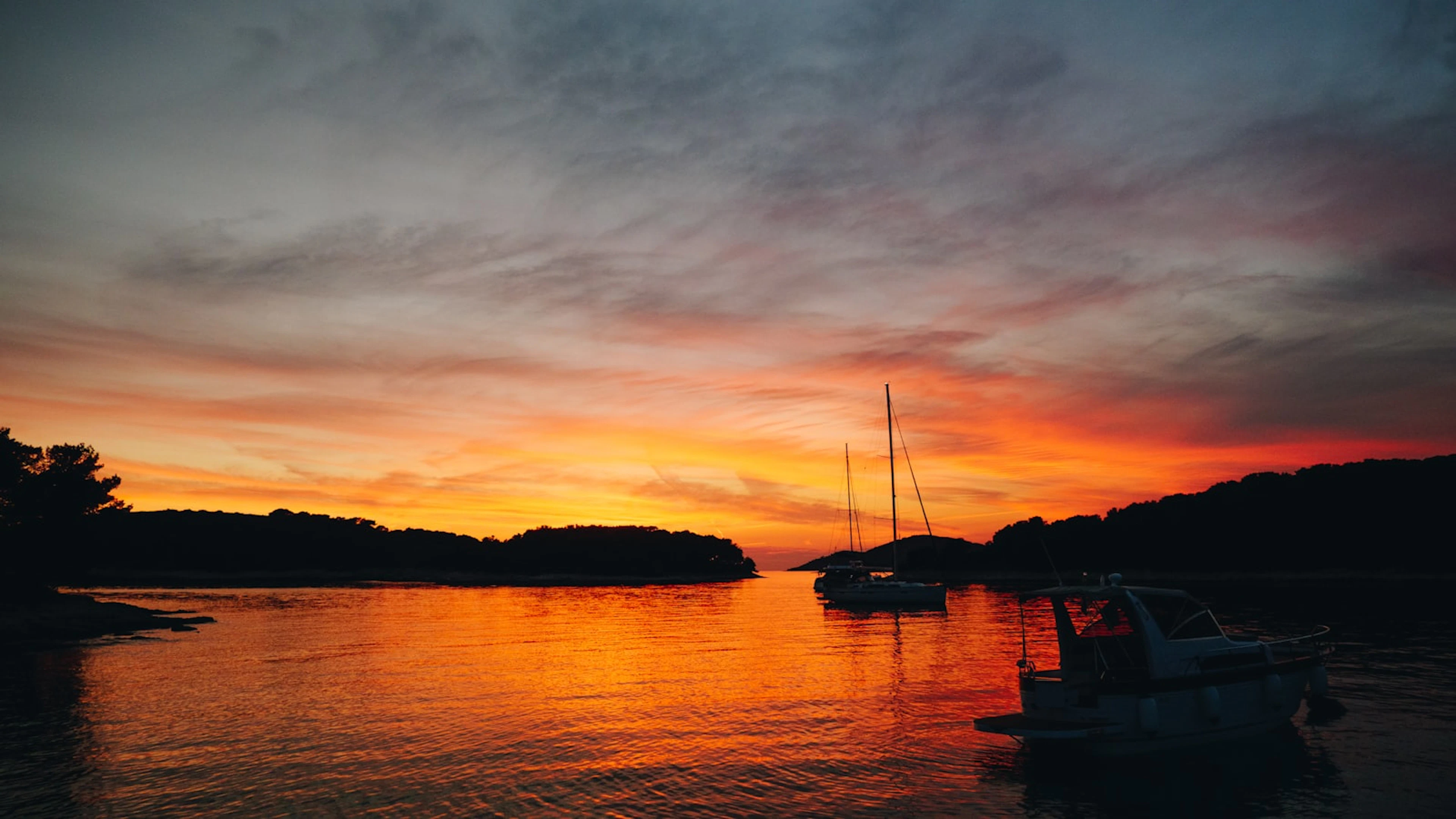 Sailboat silhouette at sunset on the Croatian Adriatic