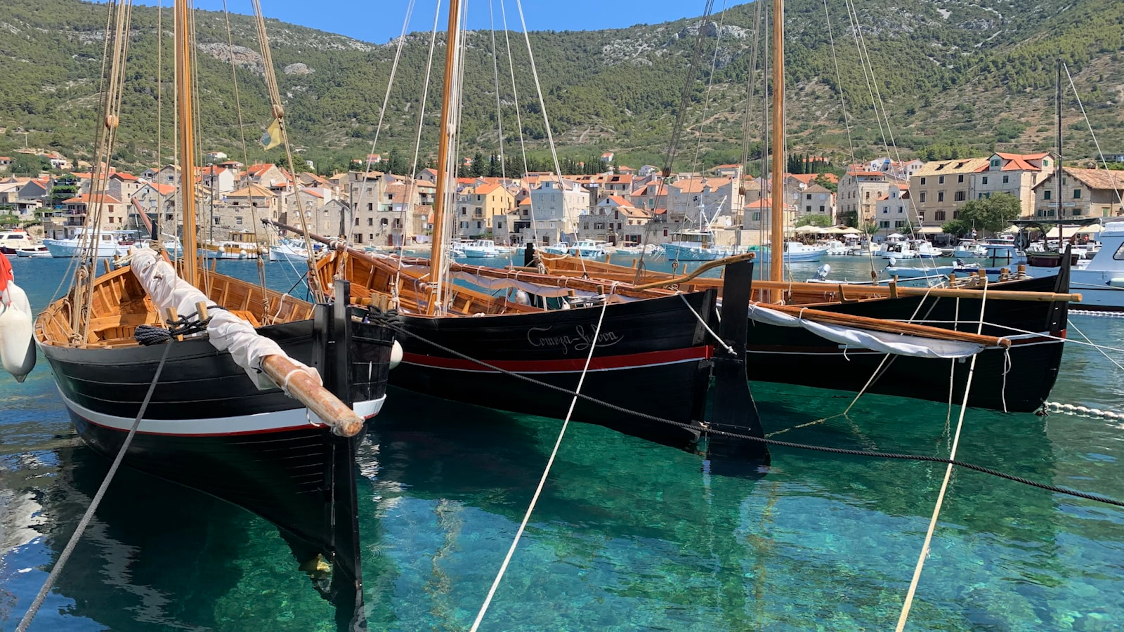 Traditional wooden boats in Komiža harbour on Vis, Croatia