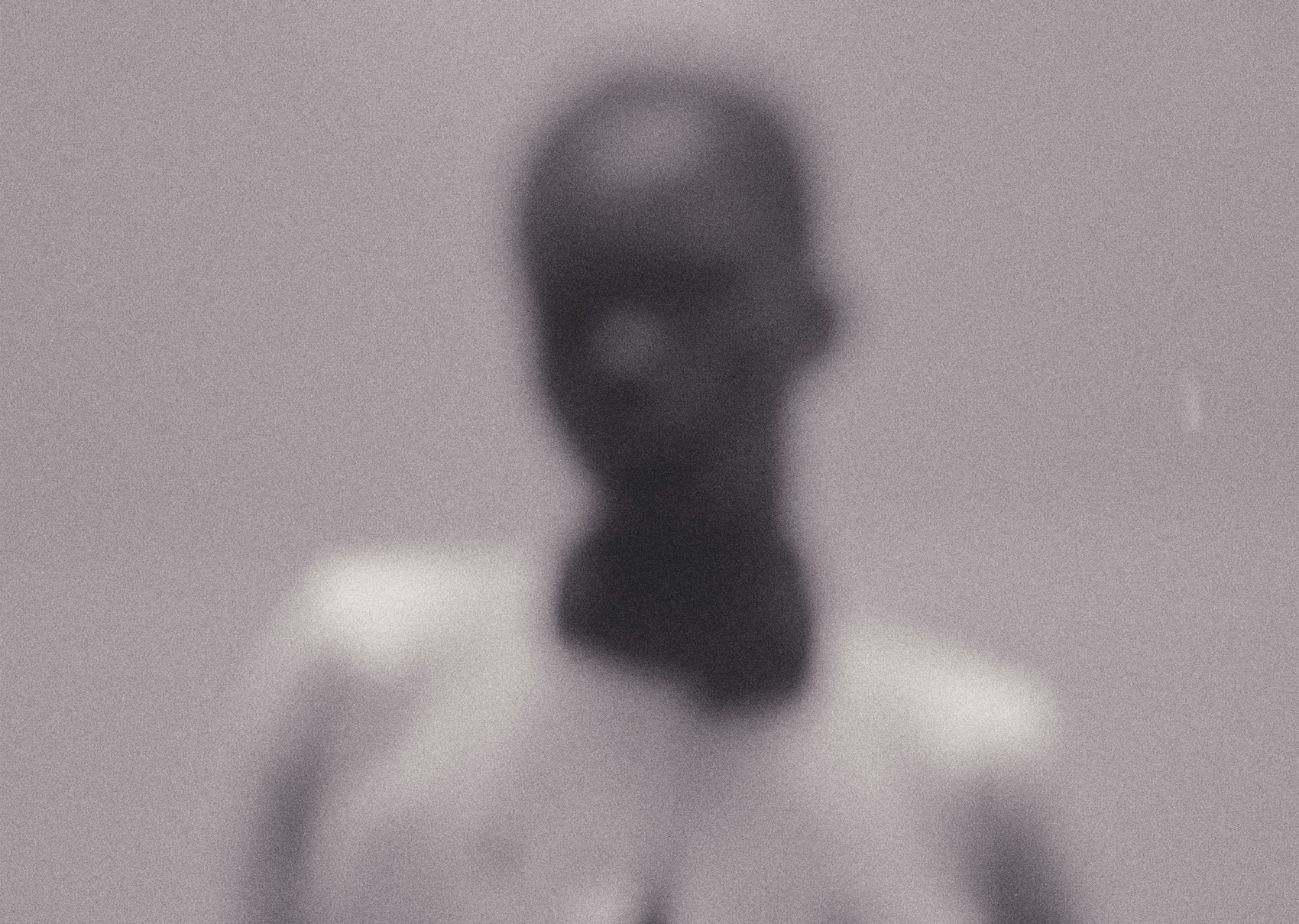 Blurry and textured photo of a woman