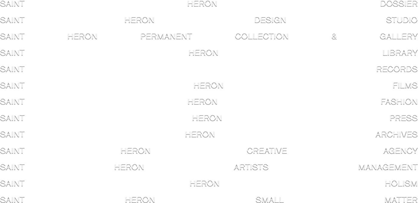 Black and white background with scattered text that says: Saint Heron, Saint Heron Design, Saint Heron premanent collection, Saint Heron, Saint Heron, Saint Heron, Saint Heron Creative, Saint Heron Artists, Saint Heron, Saint Heron,Small