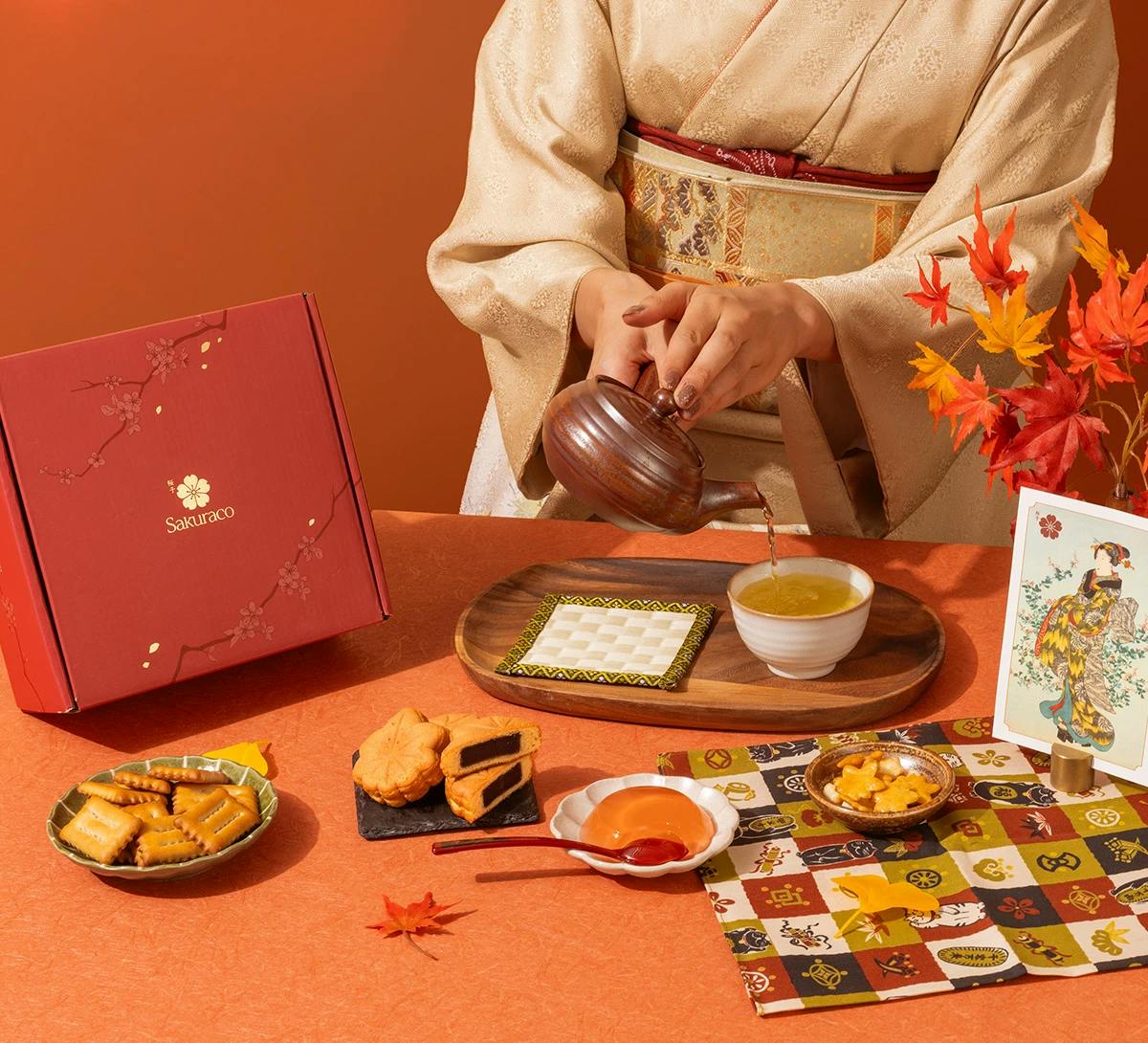 Woman in traditional kimono prepares tea.