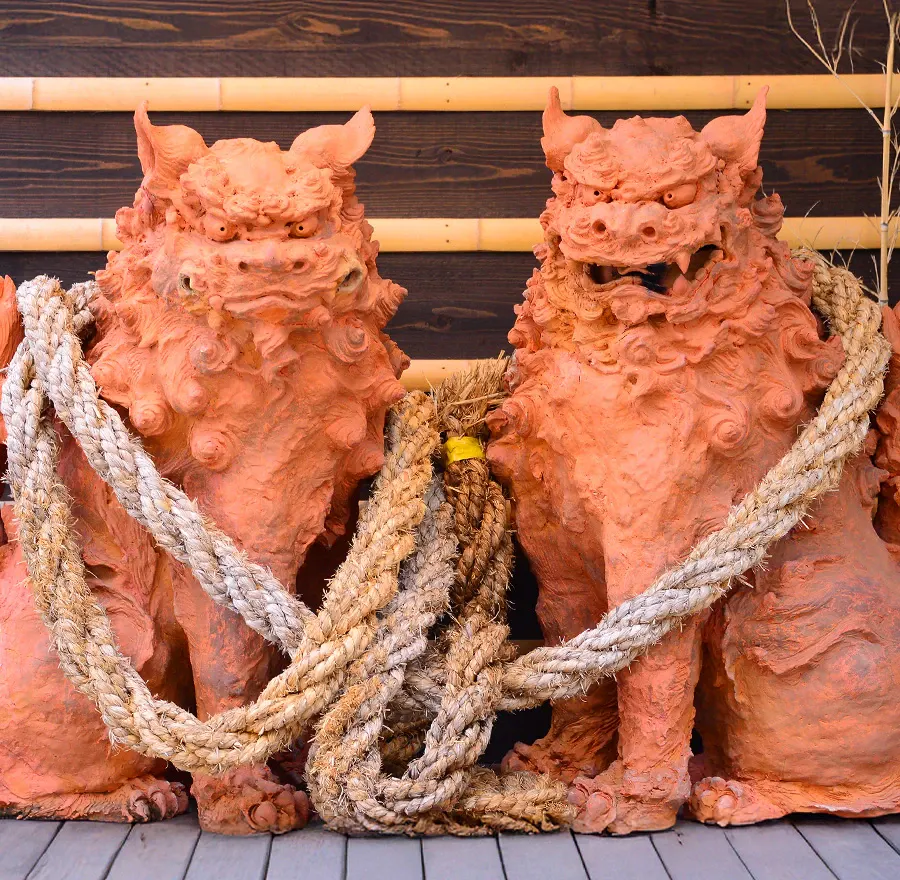 Photo of two shisa lion-dog statues in Okinawa, Japan.