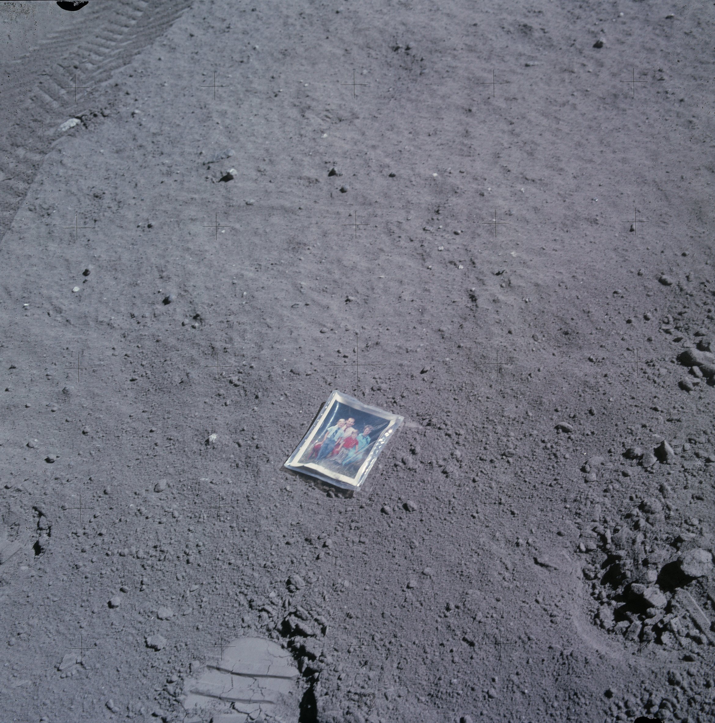 A family photo placed on the Moon ©NASA