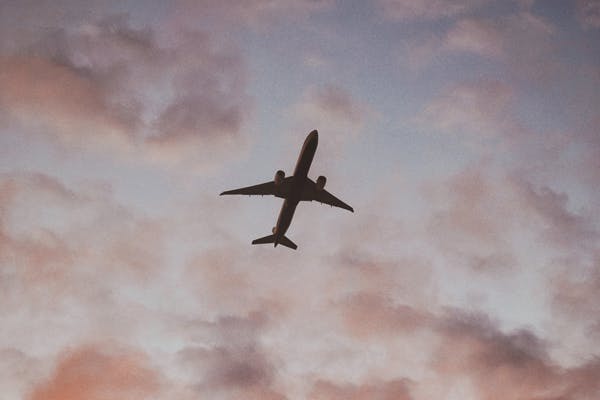 plane in the air - you can use a sleep aid to sleep on a plane
