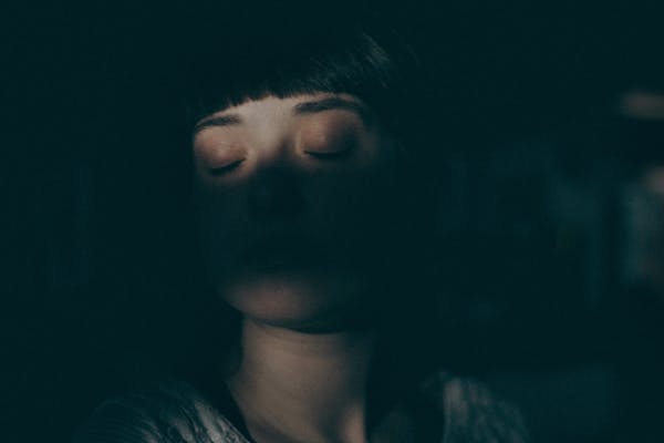 cbn sleep - woman with eyes closed
