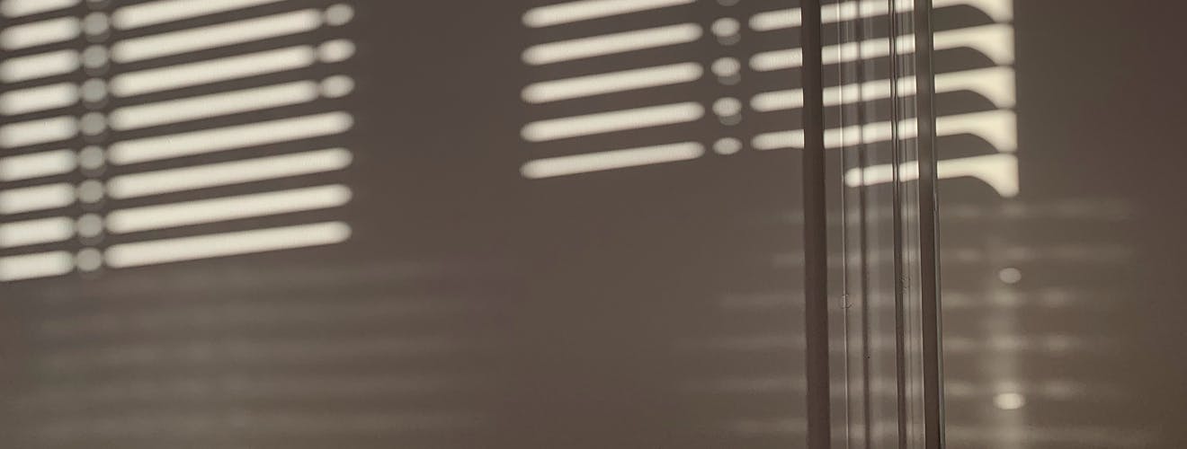 sun shining through the shades, example of sleep anxiety