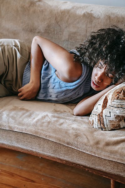 woman sleeping on a couch