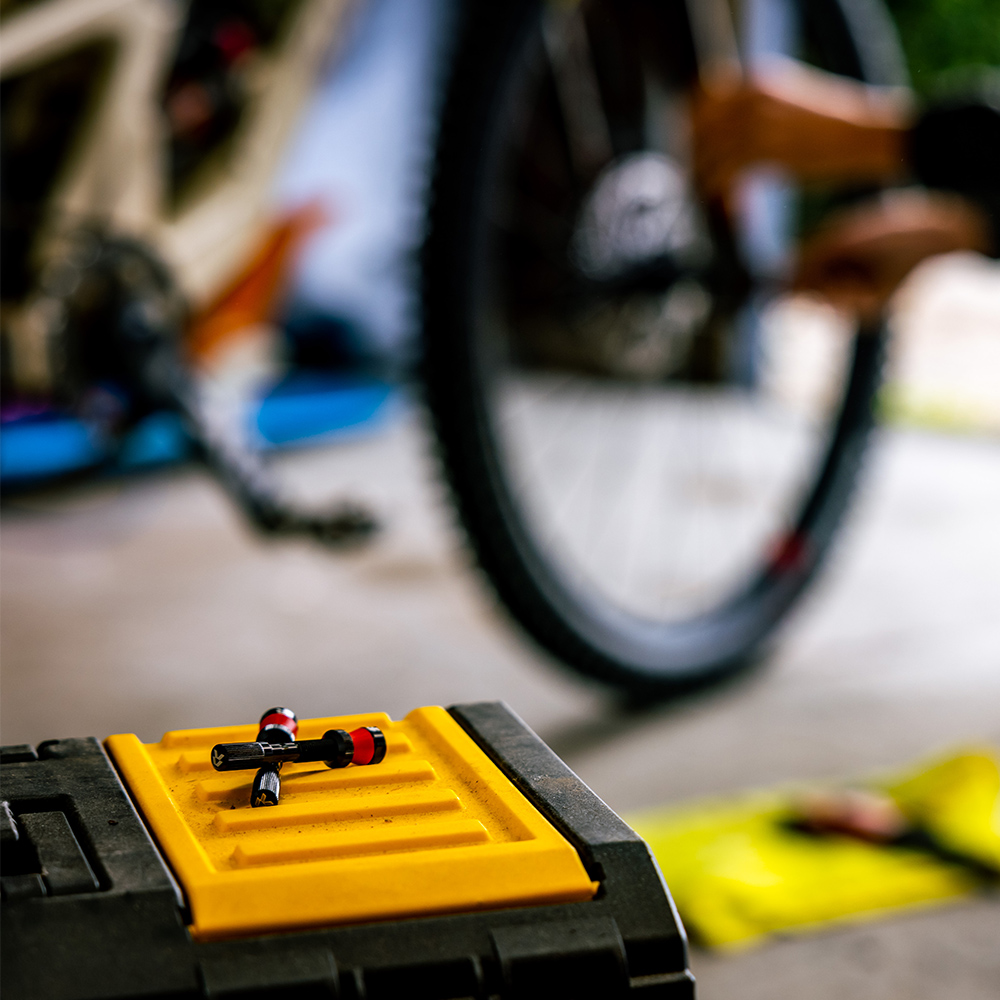 Reserve Fillmore Tubeless Valves sitting on a toolbox with a Santa Cruz bicycle in the background