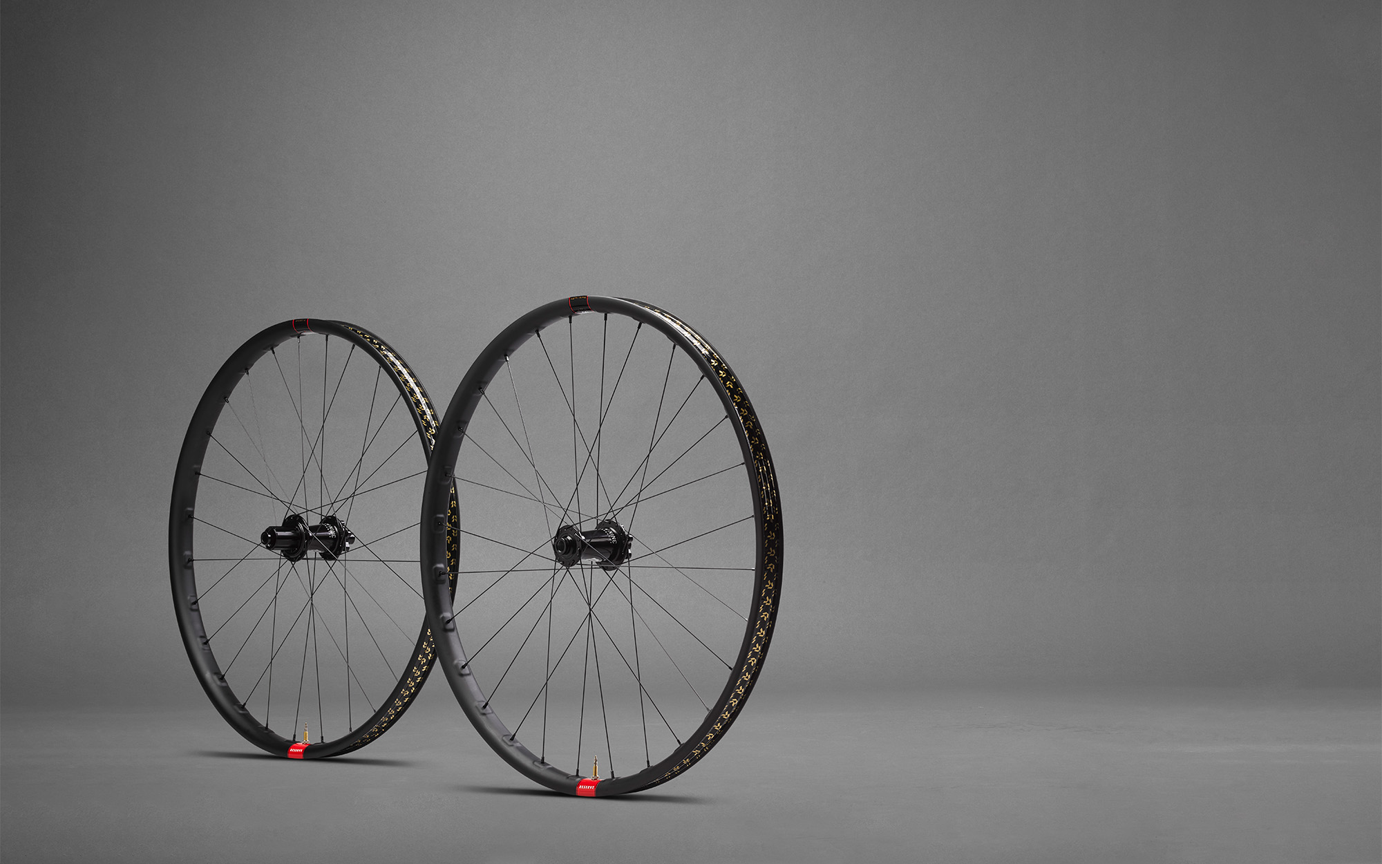 Reserve 30|HD Mountain Wheelset - Staggered with a grey studio background