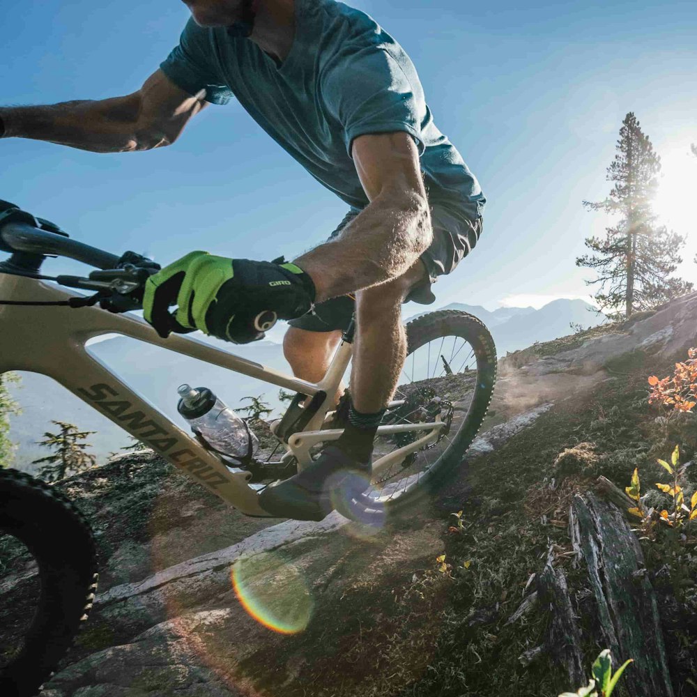 A Mountain Biker cornering on a Santa Cruz mountain bike