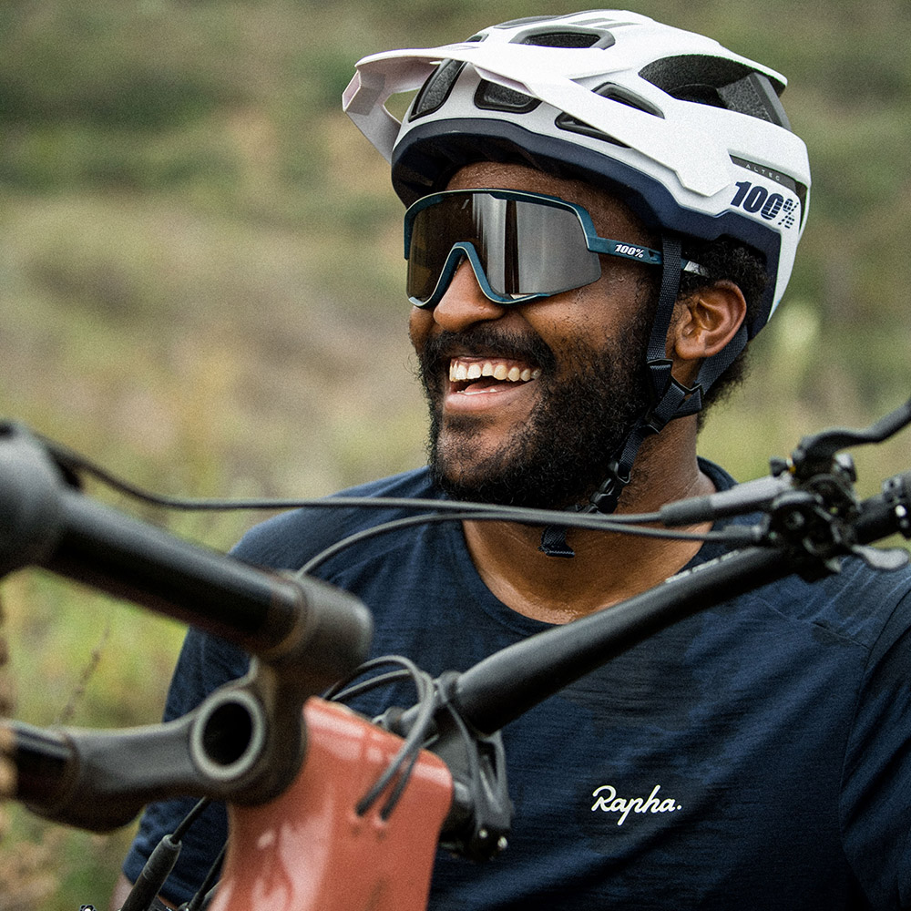 Elliot Jackson smiling for the camera and holding his Santa Cruz Bronson