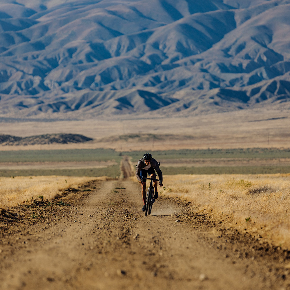 Reserve 32 Gravel Wheel on a long gravel road in the desert
