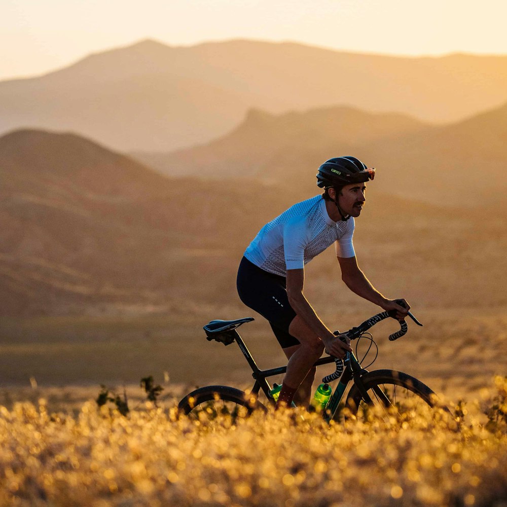 Riding a Cervelo road bike with mountains in the background