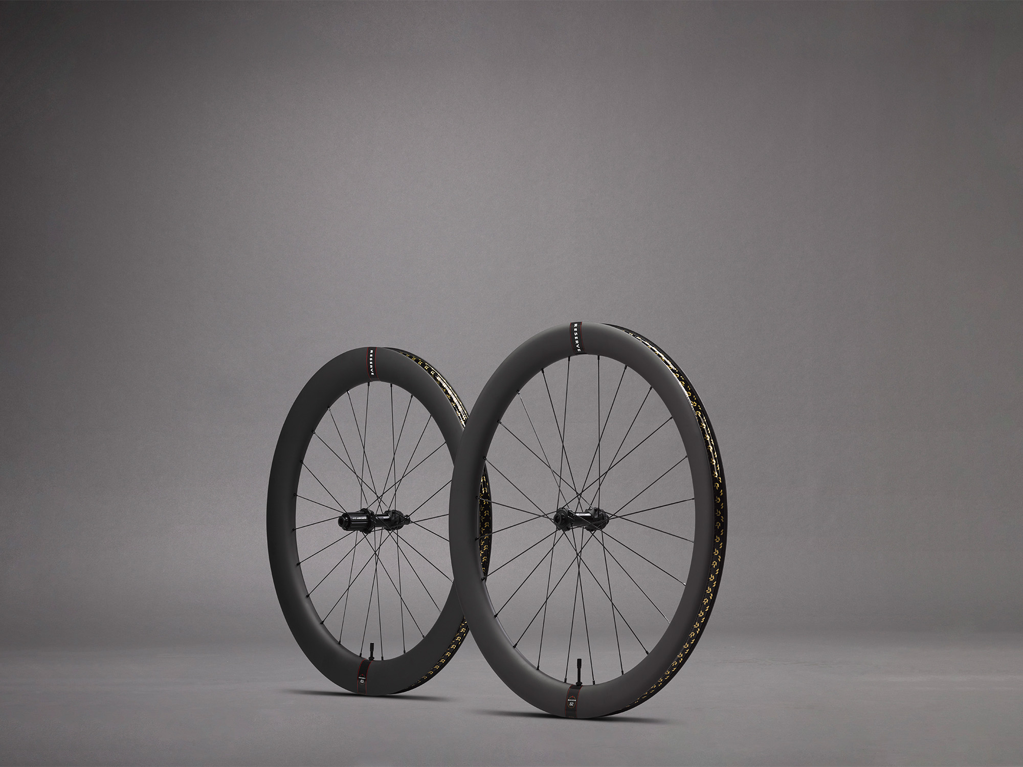 Reserve Wheels 52|63 Aero Road Wheelset, staggered with a grey background.