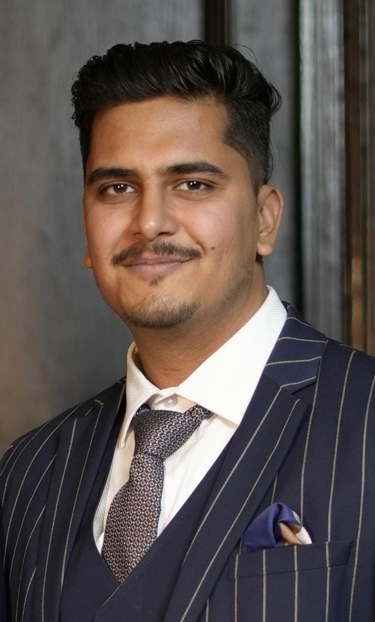 close up headshot image of rishab gupta