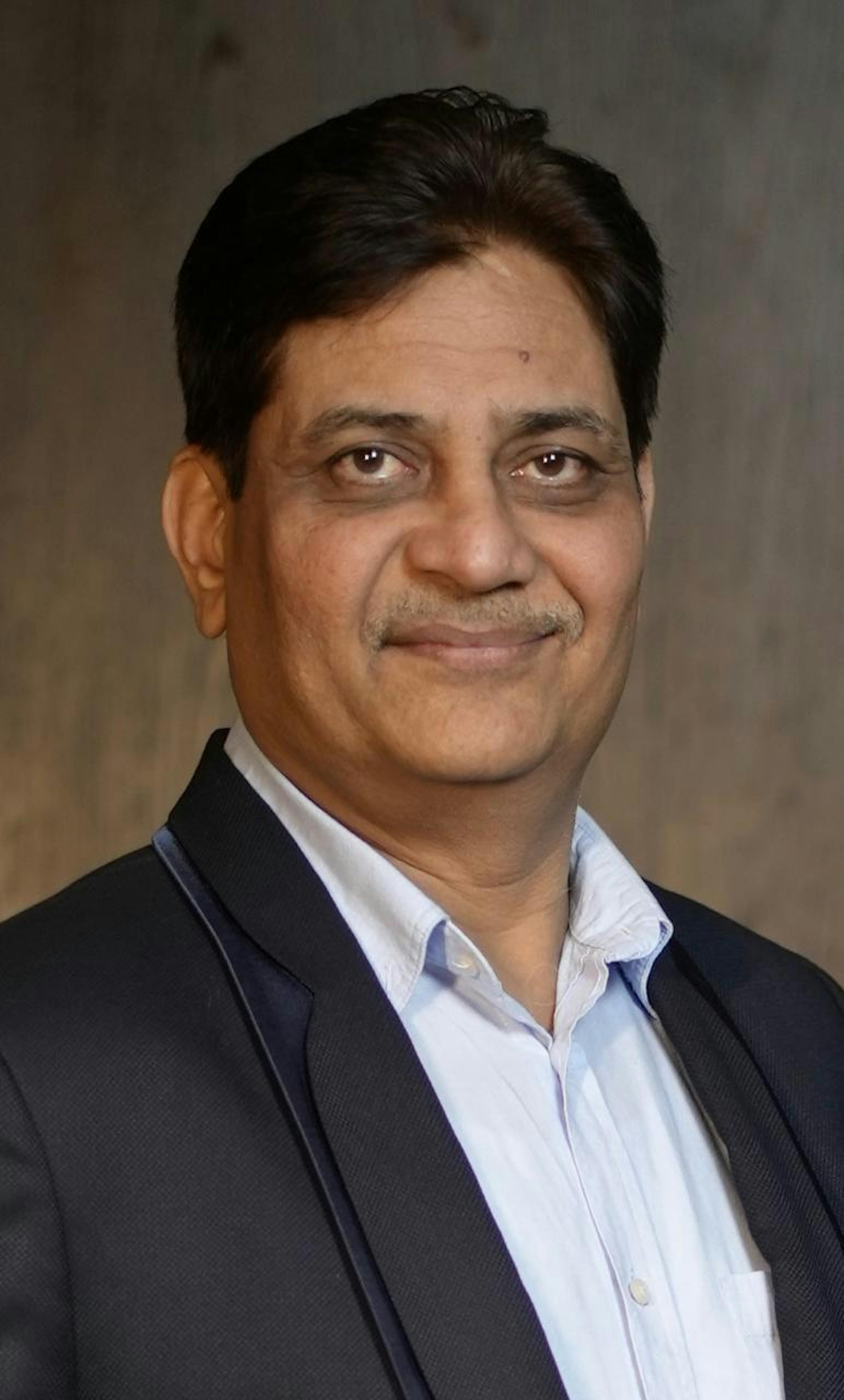 close up headshot of rakesh gupta