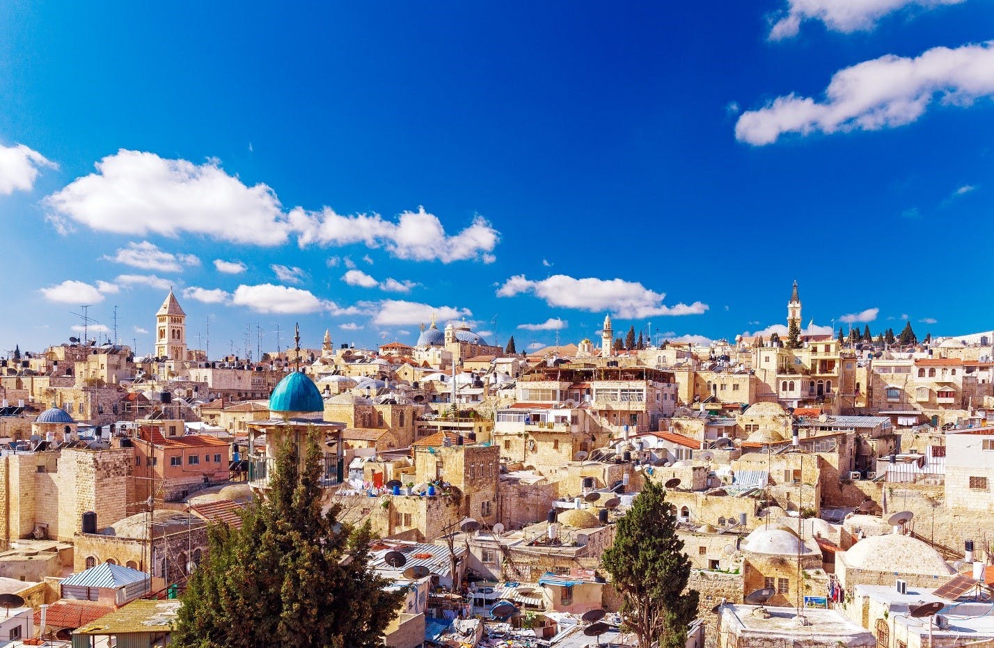 Old City of Jerusalem with blue sky above 