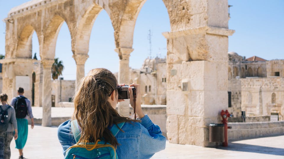 Tourist taking a picture of Jerusalem, Israel