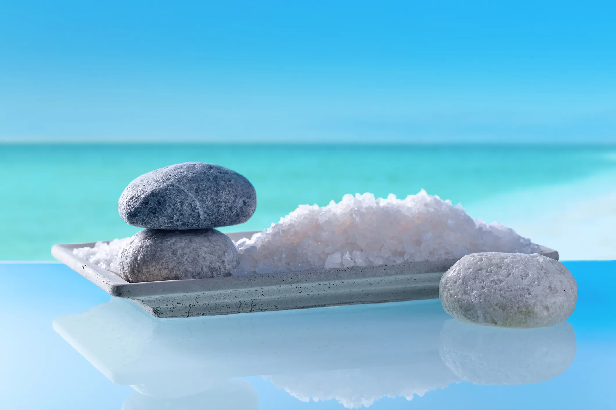 Sea salt with stones on a background of seascape