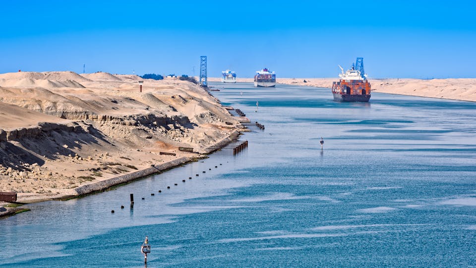Ship's convoy passing through Suez Canal