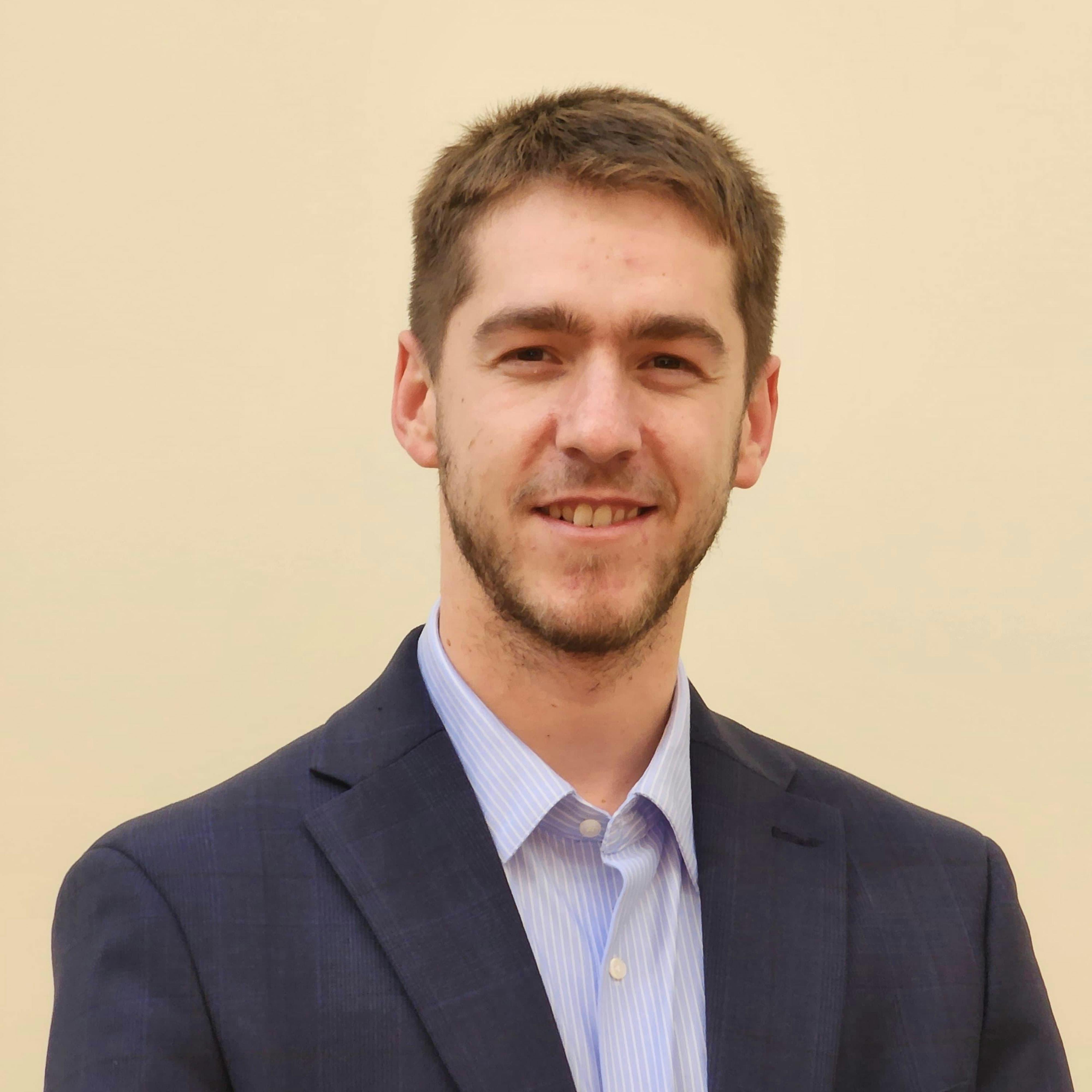 Avishai Futerman in a suit