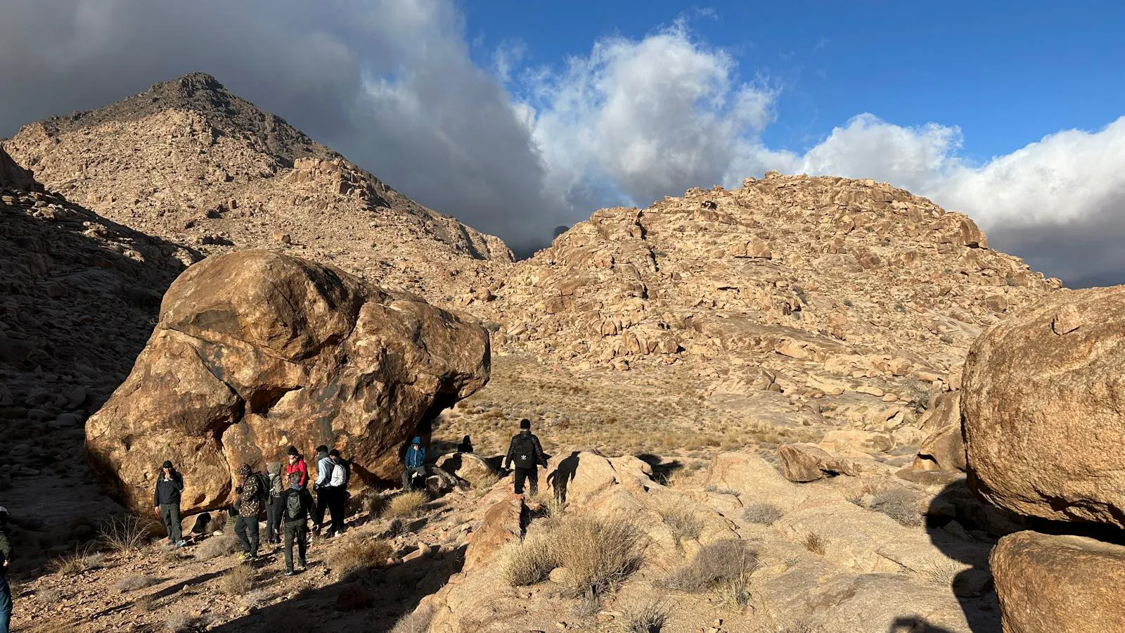 People hiking to the top of Jabal Musa in Saudi Arabia